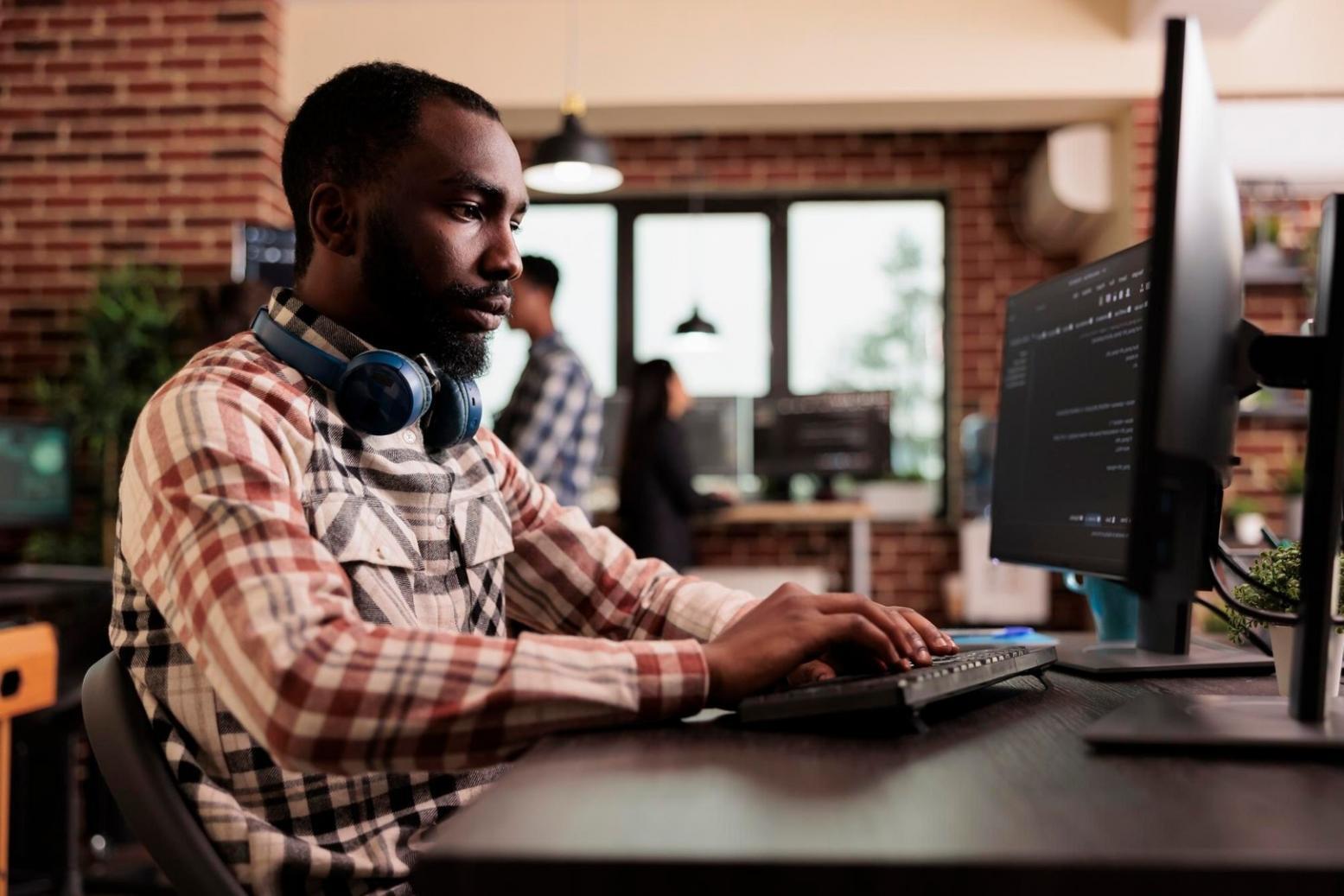 Programming workshop session showing hands-on coding practice with instructor guidance
